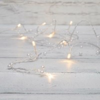 Гирлянда светодиодная “Жемчужинки” 1.5м 10LED тепл. бел. 0.1Вт IP20 провод ПВХ прозр. элементы питания 2хAA (не в компл.) Neon-Night 303-097