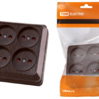 Розетка четырехместная 2П открытой установки IP20 10A с защитными шторками бук “Ладога” TDM
